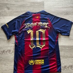 Blue and Red Soccer Jersey with Gold Accents